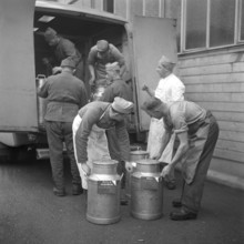 Medical orderly working in military kitchen, delivery van; 1940
