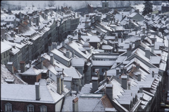 Snow-covered roofs of Bernese old town 1980