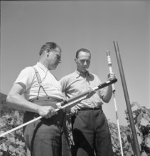 Men with hail defense rockets, 1951