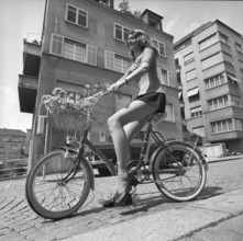 Young woman on a bike, 1973