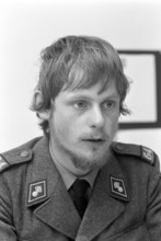 Soldier at PC to servicemen magazine Offensive: 1971