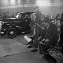 Chrysler is auctioned; 1955