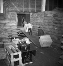 Swiss donation delivering sewing machines, 1945