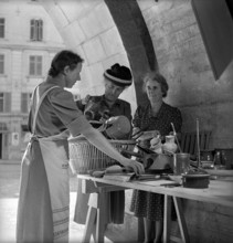 Gathering natural produce for Swiss donation, 1945
