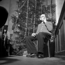 Elderly man at Christmas, 1952