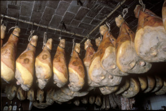 Raw ham on a market stall 1987