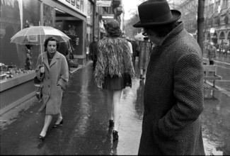 Man looking after woman, 1972