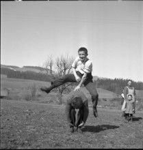 Farmer's sons leapfrogging in 1941