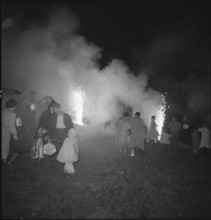 La Forclaz; people celebrating the national holiday, fireworks; 1953