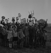 Boys with household items, 1944