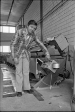 Willi Müller, inventor of a folding machine, 1974