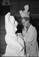 Sculptor working in artists home Riesbach, Zurich 1950