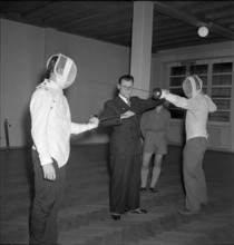 Voluntary preparatory sports instruction: fencing, ca. 1950