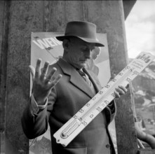 Man with thermometer, 1953