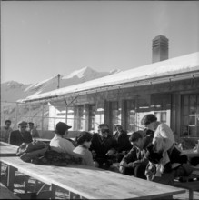 Tourists in a mountain restaurant; 1951