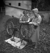 Women's Auxiliary Force; Women repair tires; 1942
