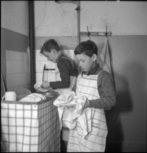 Boys washing dishes on Mother's Day, 1941