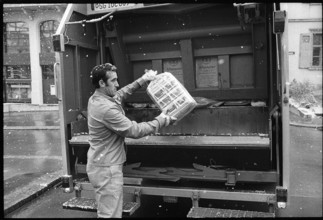 Man collecting waste paper, 1973