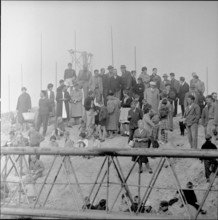Onlookers at the construction of the Zollikerberg church in 1959