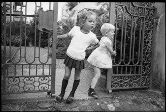 Children in front of a park entrance, 1969