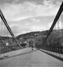 Scooter riders on the Chain Bridge in Aarau, 1947