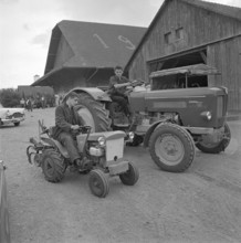 Smallest and largest tractor, 1964