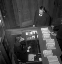 Telephone operator at work in the Federal Parliament; 1949