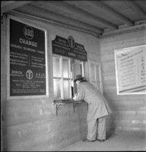 Customer at the UBS counter in GenevaCointrin Airport 1947