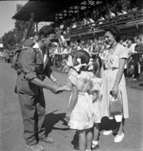 Gun runner with girl, Bern Gun Run 1949