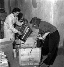 Women packing relief supplies for the SwissYugoslavian Medical Mission, 1944