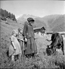 Woman and girl herding cattle on the Sommeralp, Valais 1942