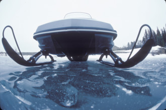 By snowmobile through the Canadian winter landscape 1982