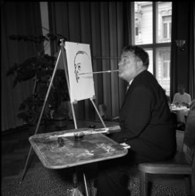 Mouth painting artist, 1961
