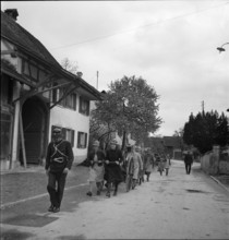 Women of the domestic fire brigade with hose truck, 1941