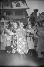 Girls dressed as Japanese at the carnival in Schwyz 1947