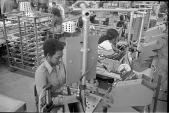 Ugandan woman as a factory worker in Burgdorf 1973