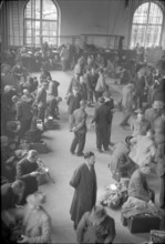 German internees waiting in the station hall. 1945