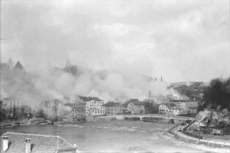WW 2: bomb airdrop, dropping. burning houses, Schaffhausen 1944