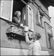 ilk man serving customer. 1941
