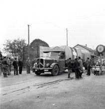 Swiss trucks crossing the border. 1944