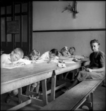refugees. hungarian and romanian children. school lessons. 1945