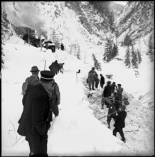 Rhaetian Railway line spilled over by avalanche, clearing work. 1951,