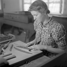 Woman working in cigar factory, 1940