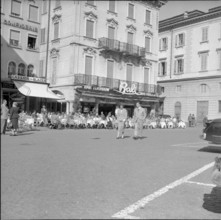 Lugano, people strolling in a narrow lane, 1956