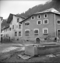 Farmer and boy taking of liquid manure in Nasen near Rehetobel, 1944
