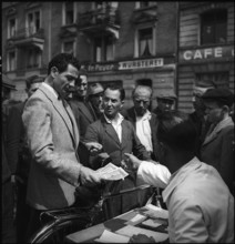 Cash transaction at the Velomarkt in Zurich 1948
