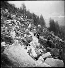 Landslide in the Maggia Valley; cleanup work, road interrupted by debris; 1950