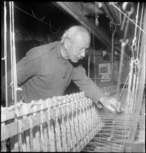 Home passementerie (silk ribbon weavers) at work, 1948