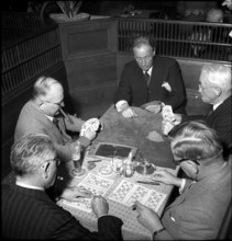 Men playing cards, 1950
