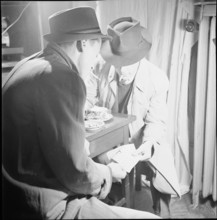 Black marketeers, trading in food stamps; 1942